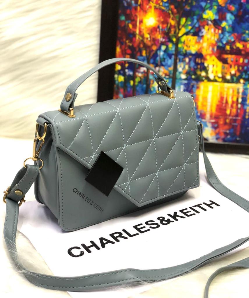Chic Minimalism: Small Sling with Front Cut Design